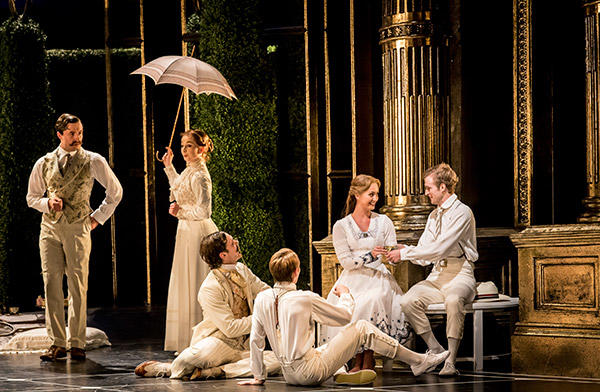 Matthew Bourne's SLEEPING BEAUTY. Ashley Shaw (Aurora) and company. Photo by Johan Persson